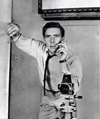 Image may contain Human Person and Tripod