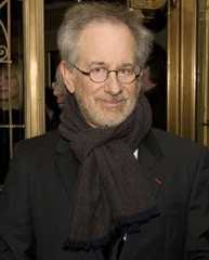 Image may contain Steven Spielberg Clothing Apparel Human Person Face Coat Interior Design and Indoors