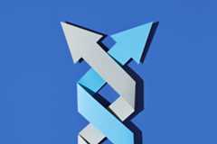 intertwined arrows on blue background