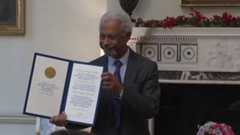 Abdulrazak Gurnah presenting his Nobel Prize diploma at the award ceremony