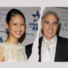 A split panel image of a smiling woman in an elegant cream and floral dress stands next to a man in a dark pinstripe suit and light tie at an Americans for the Arts National Arts Awards event.