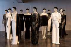 Mannequins wearing a variety of black and white pieces by Norma Kamali. (Ivy Chan for WSN)