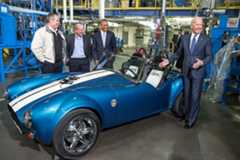President Barack Obama and Vice President Joe Biden view a 3D-printed carbon fiber Shelby Cobra car during a tour of Techmer PM in Clinton, Tenn., Jan. 9, 2015. (Official White House Photo by Pete Souza)