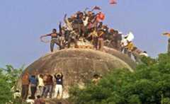 Rioters attack Babri Masjid in 1992