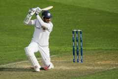 Signed, Sanga: the bent-kneed cover drive