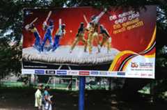 Advertiser's choice: three Sangakkaras on one hoarding