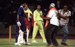Fans invade the pitch during a India-Pakistan charity game at Crystal Palace in 1992