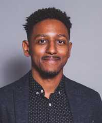 Dr. Aymar Jean Christian Headshot