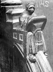 Accoudoir: femme frabriquant de la dentelle