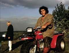 Andre the Giant riding his ATV on location of the film 'The Princess Bride'