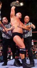 Stone Cold Steve Austin holding up the belt after his neck injury career ending match