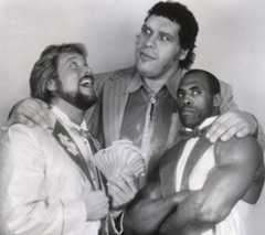 Million Dollar Man Ted DiBiase, Andre the Giant and Virgil with Andre's arms around them