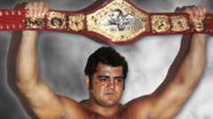 Pedro Morales hoists the WWWF Championship, embodying the raw passion of 1970s wrestling at Madison Square Garden.
