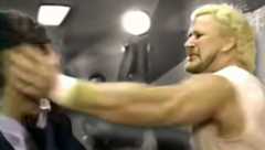 Dr. D David Schultz delivers the infamous slaps to reporter John Stossel during a 20/20 interview, marking one of wrestling’s most notorious moments and sparking a debate about kayfabe and media scrutiny.