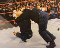 Stone Cold Steve Austin delivers the very first Stone Cold Stunner on Vince McMahon in 1997.