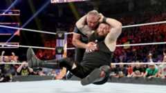 Kevin Owens hits the Stunner on Shane McMahon.