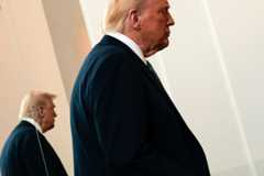 President Donald Trump, seen Monday during a tour at the John F. Kennedy Center for the Performing Arts, posted on social media Tuesday that the judge in the case should be impeached.  