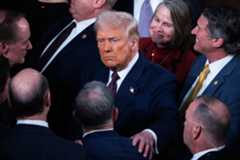 President Donald Trump greets members after addressing a joint session of Congress in the House Chamber of the U.S. Capitol on Tuesday, March 4, 2025. 