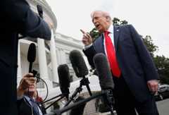 President Donald Trump speaks to reporters Tuesday as he departs the White House en route to London. 