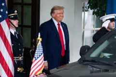 President Donald Trump prepares to greet Ukrainian President Volodymyr Zelenskyy at the White House before a meeting with European leaders on Aug. 18.