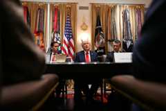 President Donald Trump, flanked by Secretary of State Marco Rubio, left, and Defense Secretary Pete Hegseth, speaks during a Cabinet meeting at the White House on Thursday. (Jim Watson/AFP via Getty Images)