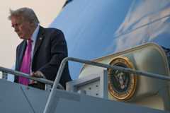 President Donald Trump walks down the steps of Air Force One at West Palm Beach International Airport in Florida on Oct. 17. (Alex Wong/Getty Images)