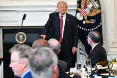 President Donald Trump concludes his remarks during a breakfast meeting with Senate Republicans in the State Dining Room of the White House on Wednesday.