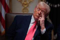 President Donald Trump attends a meeting of his Cabinet at the White House on Tuesday.