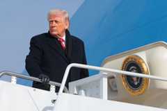 President Donald Trump boards Air Force One on Jan. 16 at Joint Base Andrews, Md. (Anna Moneymaker/Getty Images)