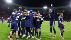 Sensational Scotland strike late to seal World Cup place