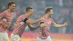 Cologne win as nine-man Hamburg go into meltdown