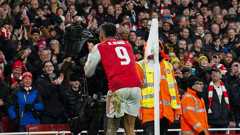 Quadruple chasing Arsenal rout Wigan to reach FA Cup fifth round