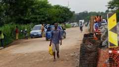 part of rehabilitated Dwangwa bridge which was washed away by the water cutting off the road which is is vital for transport agricultural products and commodities across the country .