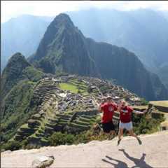 Two WSU students jumping for joy at the top on Machu Picchu.