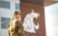 ROTC  and Marching Band Leader leads the band on Gesa Field at Washington State University, Saturday, September, 11, 2021