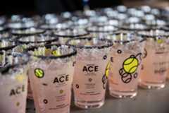 Rows of pink Ace paloma cocktails.