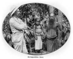John Hagenbeck (left) with two Singhalesen Dorf (Sinhalese Village) performers