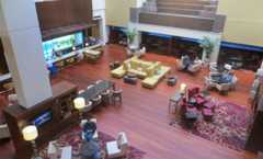 Those people are part of a year-long art piece in the lobby. Honest.