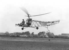 Captain H. Franklin Gregory at the controls of the VS-300.