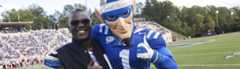 <h3>FIRST BLACK BLUE DEVIL</h3><p>Michael Holyfield, T’79, the first black Blue Devil mascot, returned to campus during homecoming weekend when he was recognized with a letterman’s jacket for his service to Duke.</p><div class="more_button"> <a href="http://today.duke.edu/2013/09/holyfield" target="_blank"> </a> </div>