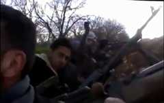 Syrian rebels battle Hezbollah operatives near Qusayr, February 2013. (photo credit: screen capture Muslim Voice/YouTube)