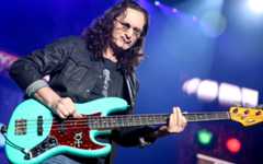 Geddy Lee of Rush performs during the final show of the R40 Tour at The Forum on Saturday, August 1, 2015, in Los Angeles. (Rich Fury/Invision/AP)
