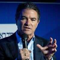 Former Mossad chief Yossi Cohen speaks at a conference of the Makor Rishon newspaper at the International Convention Center in Jerusalem, February 21, 2022. (Yonatan Sindel/ Flash90/ File)