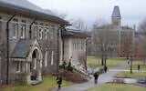 People walk on the campus of Cornell University in Ithaca, New York, February 2, 2024. (AP Photo/Seth Wenig)
