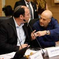 MK Simcha Rothman (L) argues with legal adviser to the Constitution, Law and Justice Committee Gur Bligh at the Knesset in Jerusalem, November 24, 2025. (Noam Moshkovitz/Knesset spokesperson office)