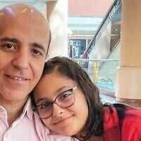 This 2023 photo provided by Safiah Mohammed shows Dr. Ali Almudhwahi, left, with his daughter, Youmna. (Safiah Mohammed via AP)