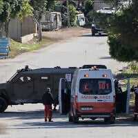 Israeli soldiers search an ambulance during a raid in the West Bank village of Tamun, on November 26, 2025. (AP Photo/Majdi Mohammed)