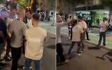 A man is detained by plainclothes police officers after standing silently in front of right-wing demonstrators at a protest in Tel Aviv on November 22, 2025. (Screenshot/X)