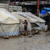 A flooded street after a rainstorm in Khan Younis, in the southern Gaza Strip, amid a ceasefire, November 25, 2025. (Abed Rahim Khatib/Flash90)