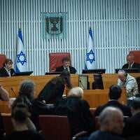 High Court President Isaac Amit arrives for a  court hearing on petitions against the appointment of retired judge Yosef Ben-Hamo to lead the probe into the Sde Teiman abuse leak, at the High Court of Justice in Jerusalem, November 27, 2025. (Yonatan Sindel/Flash90)